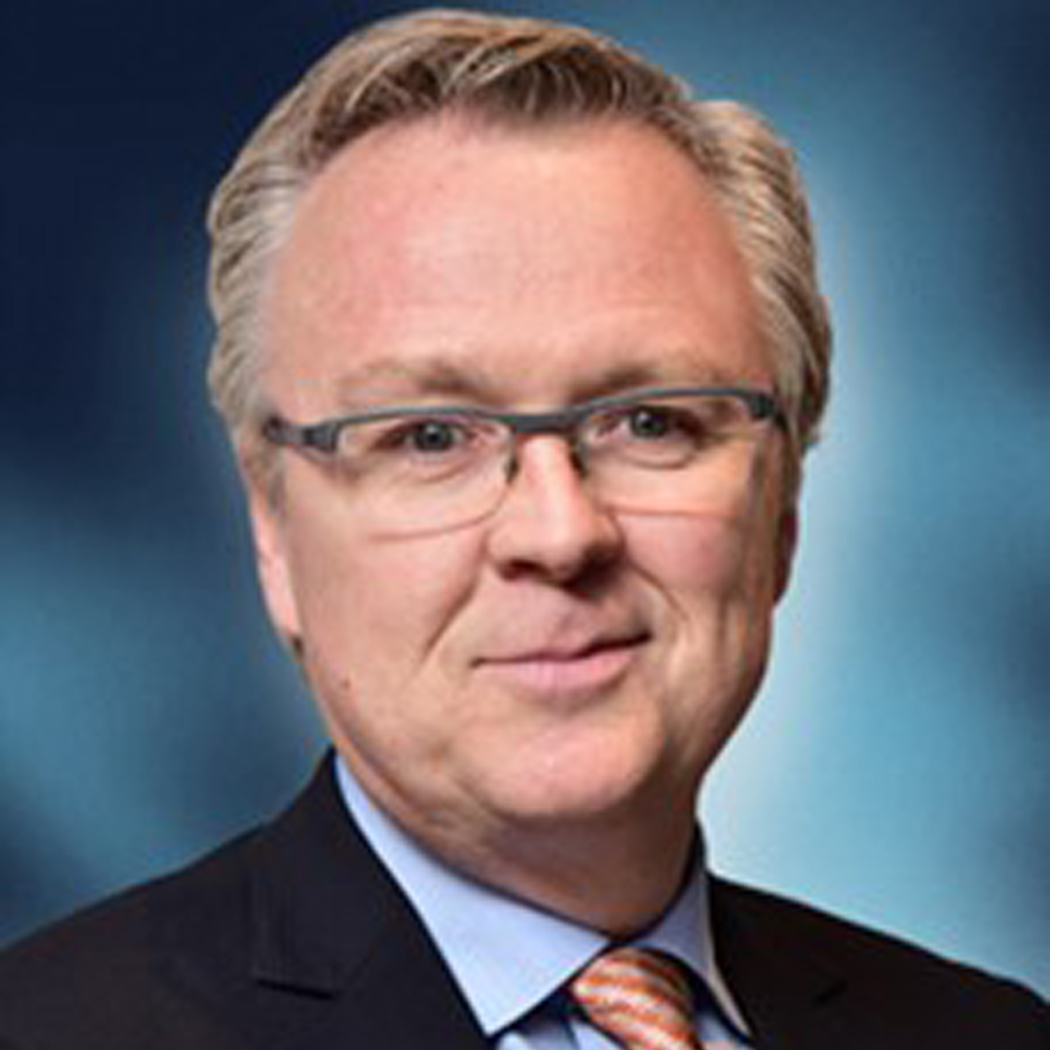Simon Tanguay - square Headshot of man in suit with glasses - Simon Tanguay.